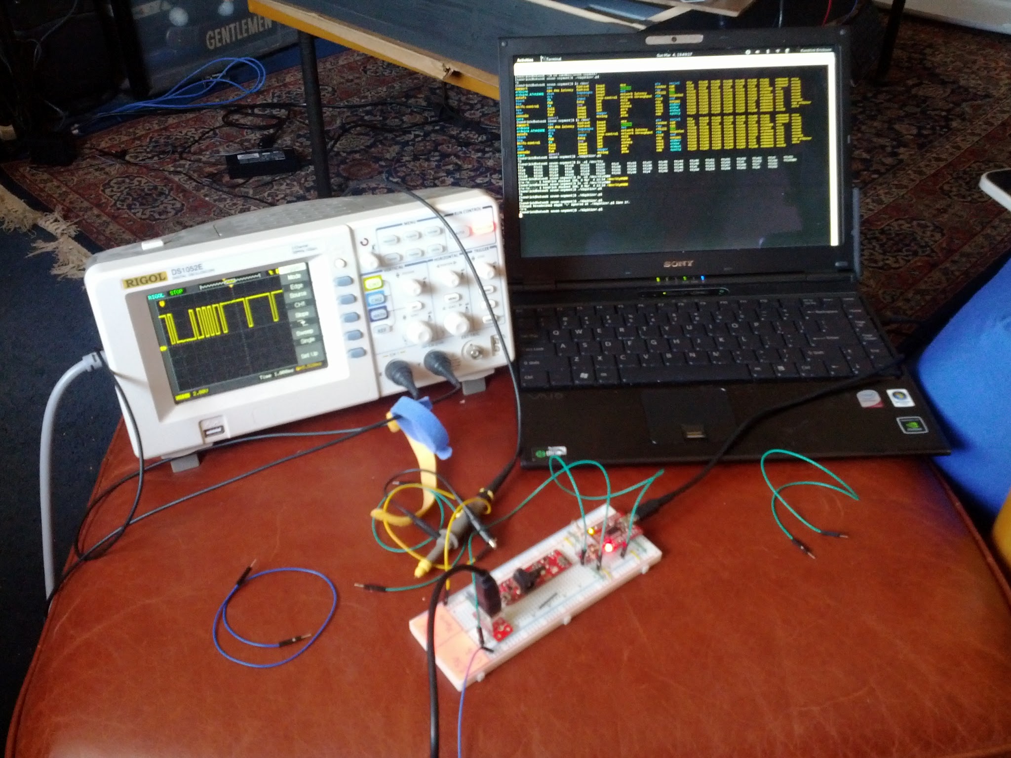 Here's the laptop next to my oscilloscope working on my large seven-segment display project.